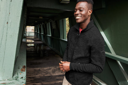 Man standing on a wooden walkway with green metal support beams, Eddie Bauer® Sweater Fleece Full-Zip, Embroidered
