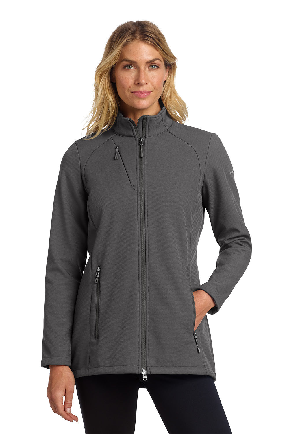 Woman wearing a gray jacket on a white background embroidered Eddie Bauer® Women's Stretch Soft Shell Jacket