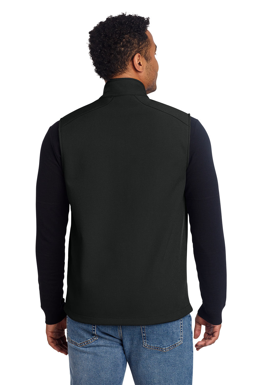 Man wearing a black vest over a dark long-sleeve shirt on a white background, embroidered Eddie Bauer® Stretch Soft Shell Vest
