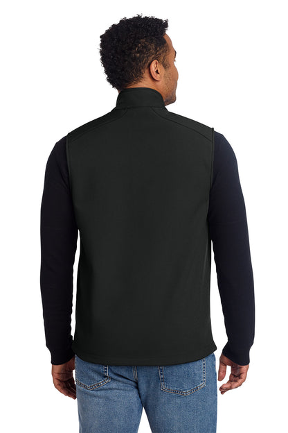 Man wearing a black vest over a dark long-sleeve shirt on a white background, embroidered Eddie Bauer® Stretch Soft Shell Vest