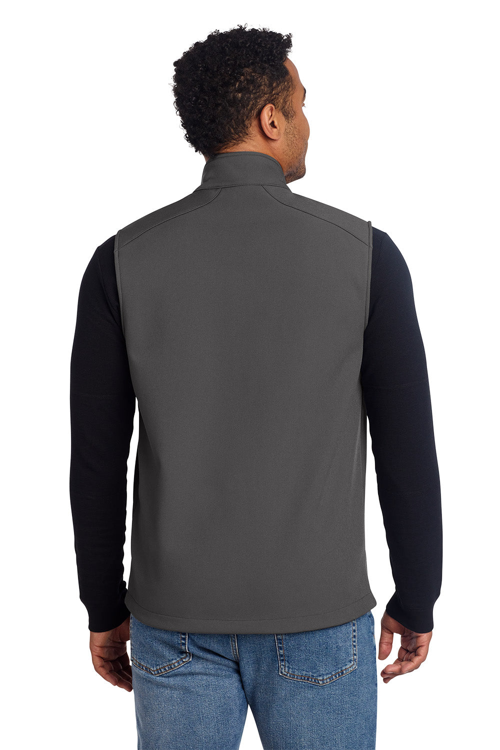 Man wearing a gray vest over a black long-sleeve shirt on a white background embroidered Eddie Bauer® Stretch Soft Shell Vest