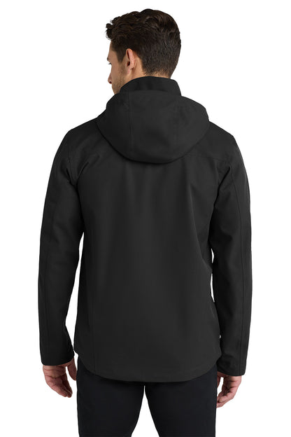 A man viewed from the back wearing a black hooded jacket and black pants against a plain white studio background. Port Authority® Collective Outer Shell Jacket, Embroidered