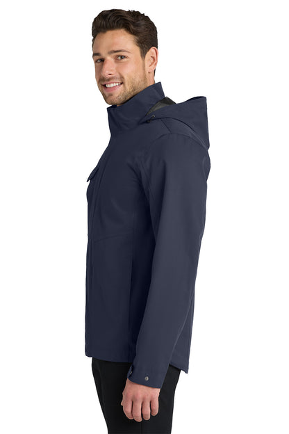 Man wearing a navy raincoat on a white background Port Authority® Collective Outer Shell Jacket, Embroidered