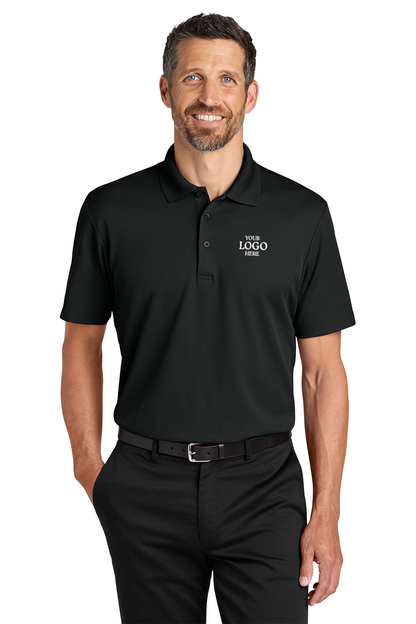 Man wearing a black polo shirt with a logo on a white background. Port Authority® Plaited Pique Polo, Embroidered by Helmsman Stitch Co.