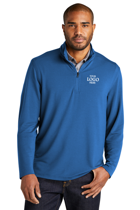 Man wearing a blue pullover with a logo placeholder on a white background. Port Authority® Microterry 1/4-Zip Pullover, Embroidered by Helmsman Stitch Co.