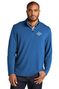 Man wearing a blue pullover with a logo placeholder on a white background. Port Authority® Microterry 1/4-Zip Pullover, Embroidered by Helmsman Stitch Co.