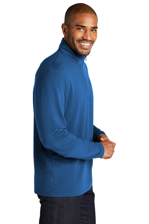 Man wearing a blue pullover on a white background. Port Authority® Microterry 1/4-Zip Pullover, Embroidered by Helmsman Stitch Co.