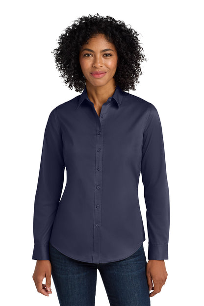 Woman wearing a navy blue button-up shirt on a white background Port Authority® Women's SuperPro™ Twill Shirt, Embroidered