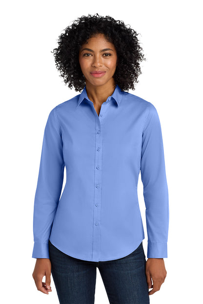 Woman wearing a light blue button-up shirt on a white background Port Authority® Women's SuperPro™ Twill Shirt, Embroidered