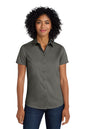 Woman wearing a gray short-sleeve shirt on a white background Port Authority® Women's Short Sleeve SuperPro™ Twill Shirt, Embroidered
