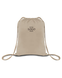 Beige drawstring bag with space for a logo on a white background. OAD Economical Canvas Pack, Embroidered by Helmsman Stitch Co.