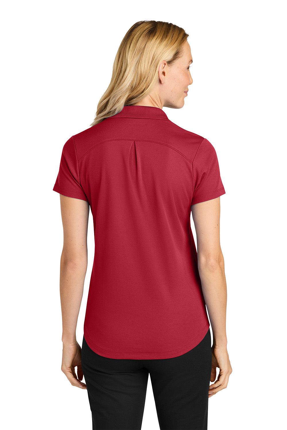 Woman wearing a red polo shirt on a white background. Port Authority® Women’s Plaited Pique Polo, Embroidered by Helmsman Stitch Co.
