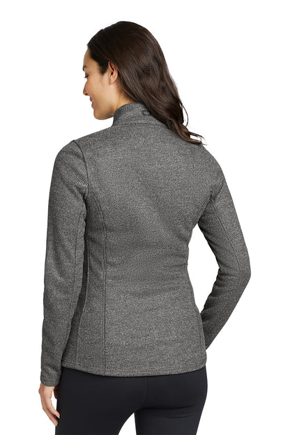 Woman wearing a gray jacket on a white background Embroidered OGIO® Women's Grit Fleece Jacket