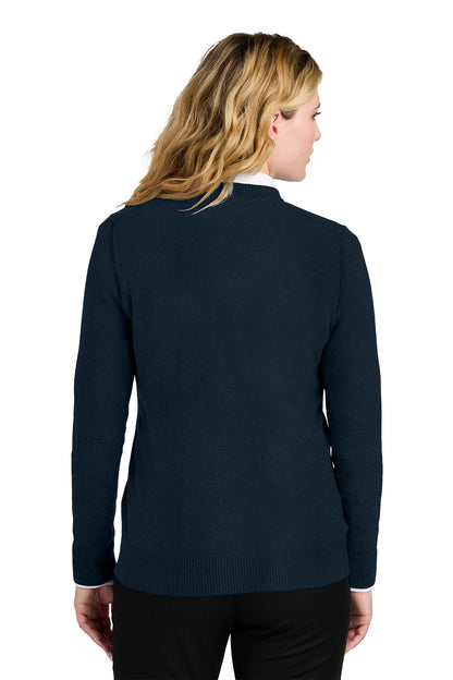 Person wearing a navy blue long-sleeve top on a white background. Port Authority® Women’s Easy Care V-Neck Sweater, Embroidered