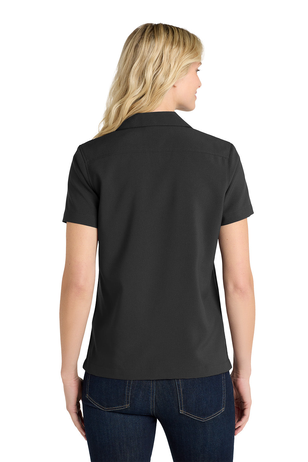 Person wearing a black polo shirt on a white background embroidered Port Authority® Women's Short Sleeve Performance Staff Shirt