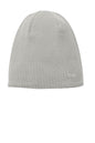 Gray knit beanie with a brand logo on a white background embroidered New Era® Knit Beanie