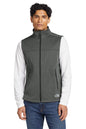 Man wearing a gray vest over a white shirt with a white background, embroidered The North Face® Ridgewall Soft Shell Vest