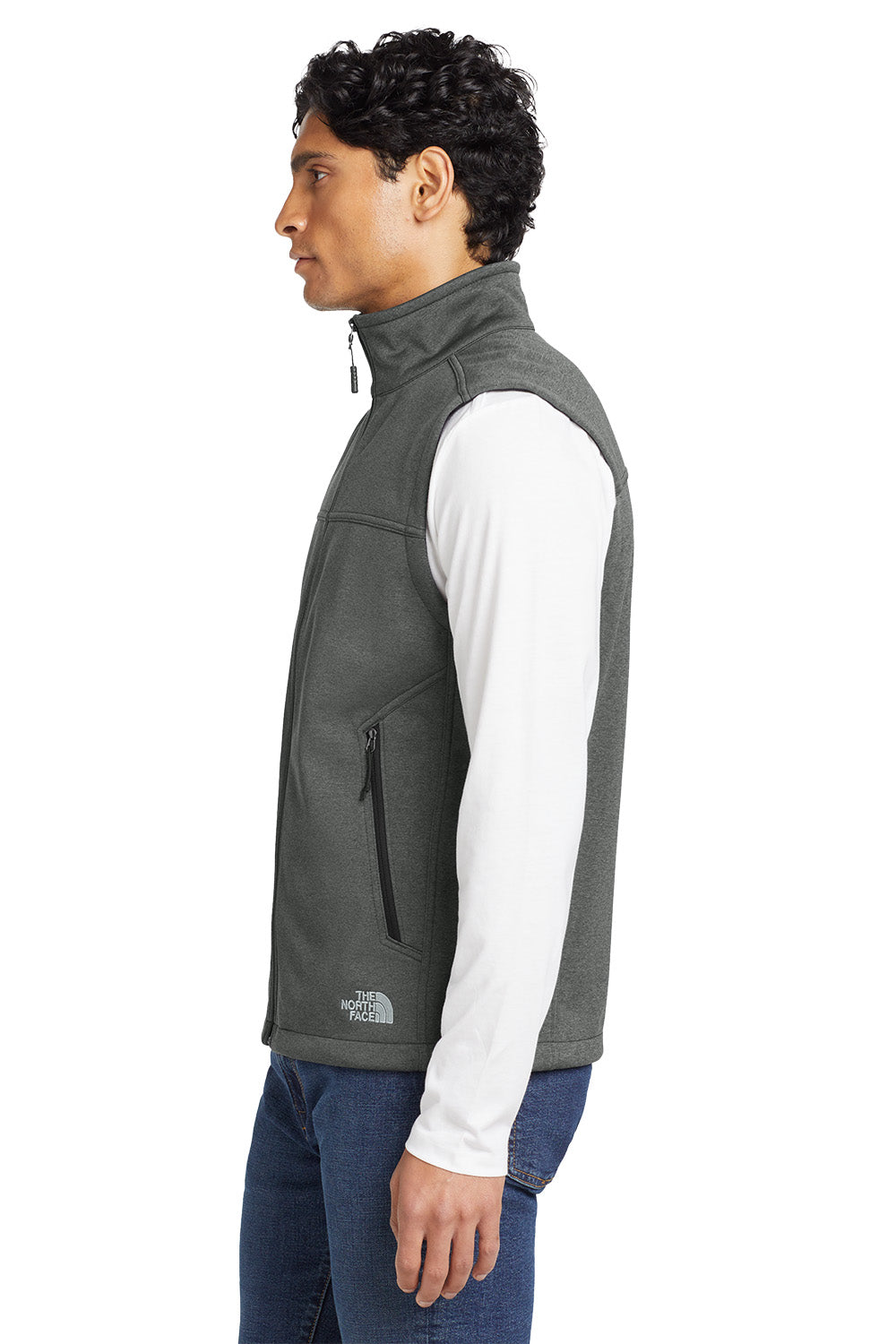 Person wearing a gray vest over a white shirt on a white background, embroidered The North Face® Ridgewall Soft Shell Vest