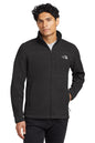 Man wearing a black jacket with a brand logo on a white background embroidered The North Face® Sweater Fleece Jacket