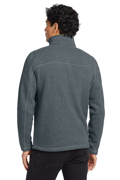 Person wearing a gray fleece jacket on a white background embroidered The North Face® Sweater Fleece Jacket