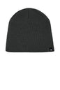 A dark gray ribbed knit beanie hat with a small black embroidered logo of The North Face on the lower right side, shown against a plain white background. The North Face® Mountain Beanie, Embroidered