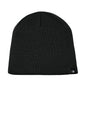A black ribbed knit beanie hat with a small black embroidered logo of The North Face on the lower right side, shown against a plain white background. The North Face® Mountain Beanie, Embroidered