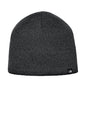 A dark gray heathered knit beanie hat with a small black embroidered logo on the lower right side, shown against a plain white background. The North Face® Mountain Beanie, Embroidered