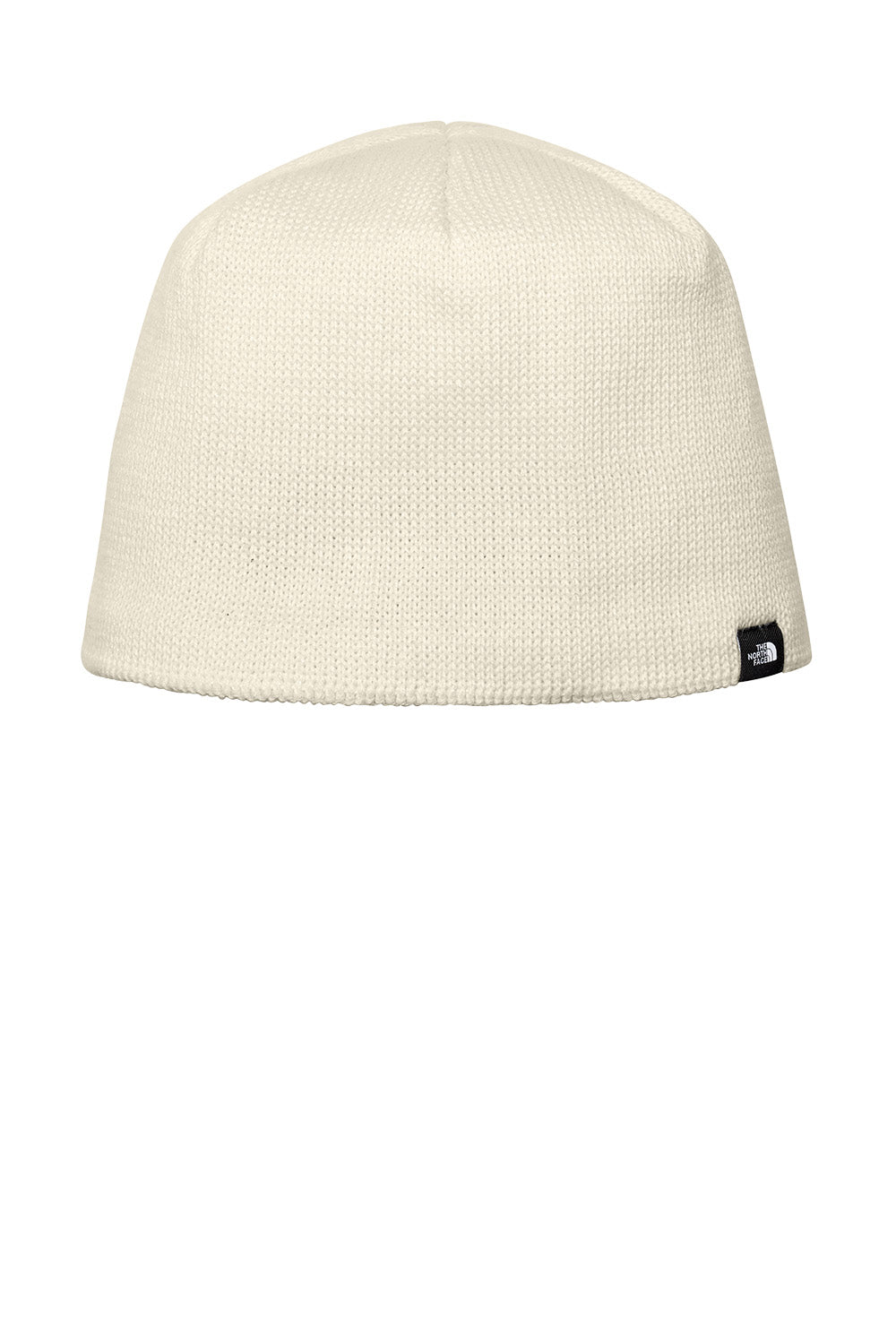 An off-white knit beanie hat with a small black and white The North Face logo patch on the lower right side, shown against a plain white background. The North Face® Mountain Beanie, Embroidered