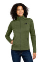 Woman wearing a green fleece jacket with a brand logo on a white background embroidered The North Face® Women's Skyline Full-Zip Fleece Jacket
