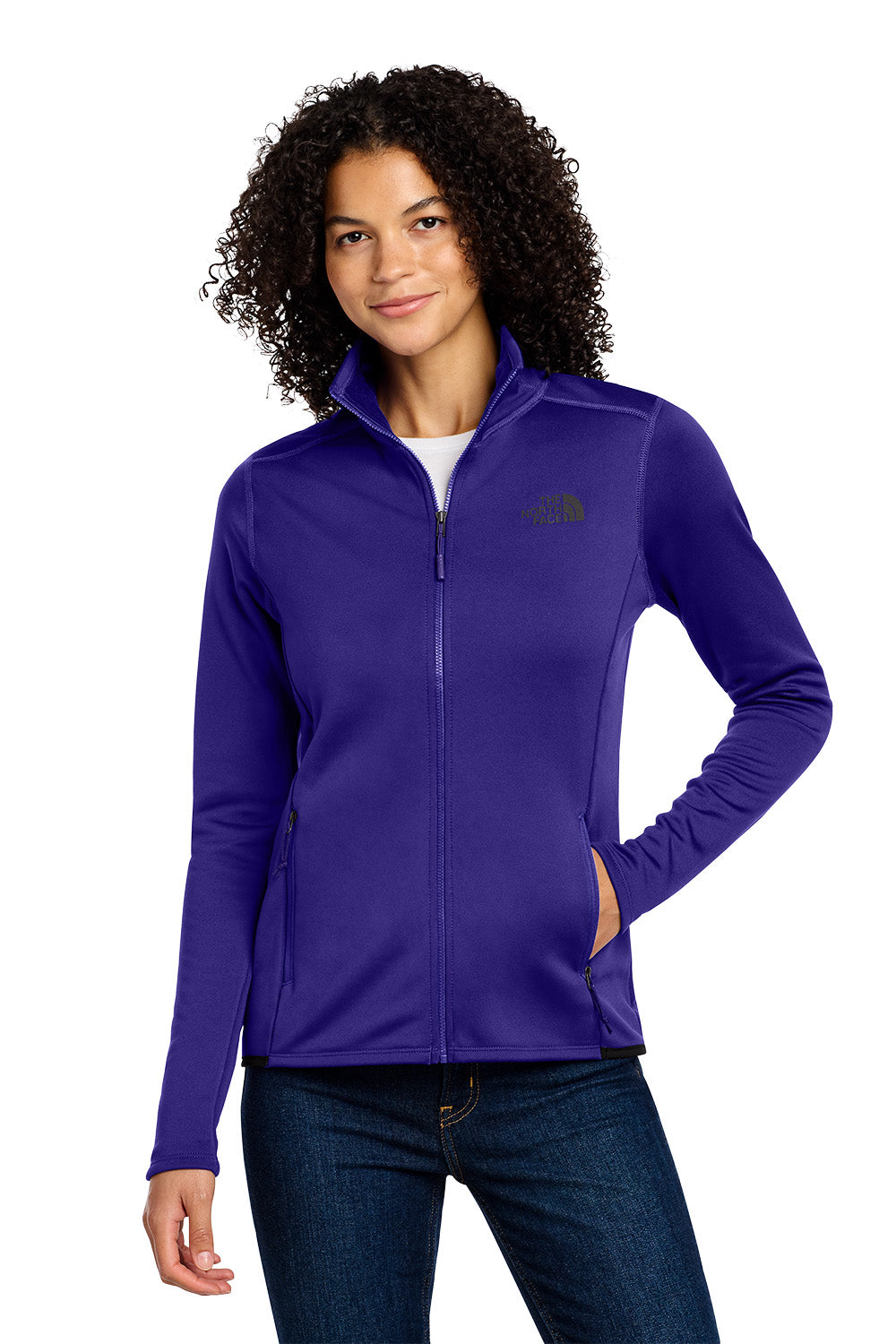 Woman wearing a purple jacket with a brand logo on a white background embroidered The North Face® Women's Skyline Full-Zip Fleece Jacket