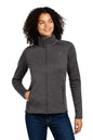 Woman wearing a gray jacket with a brand logo on a white background embroidered The North Face® Women's Skyline Full-Zip Fleece Jacket