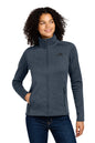 Woman wearing a gray jacket with a brand logo on a white background embroidered The North Face® Women's Skyline Full-Zip Fleece Jacket