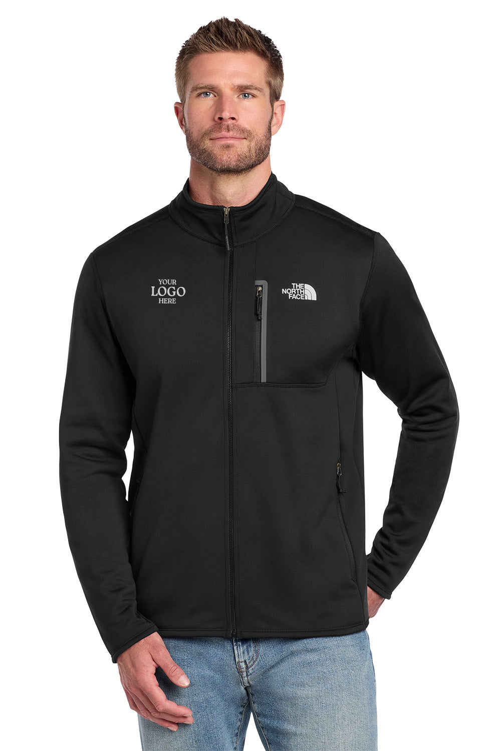 Man wearing a black jacket with logos on a white background embroidered The North Face® Skyline Full-Zip Fleece Jacket