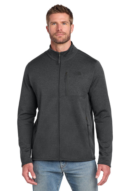Man wearing a dark gray fleece jacket on a white background embroidered The North Face® Skyline Full-Zip Fleece Jacket