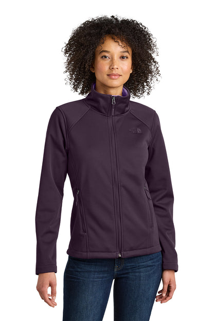Woman wearing a purple jacket on a white background embroidered The North Face® Women's Chest Logo Ridgewall Soft Shell Jacket