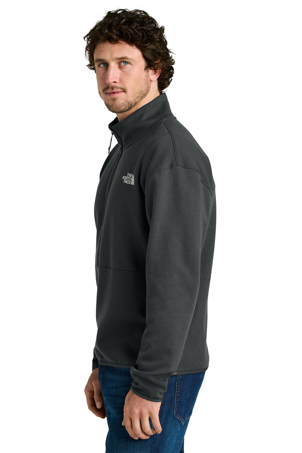 Man wearing a gray fleece jacket with a logo on a white background, embroidered The North Face® Double-Knit 1/2-Zip Fleece