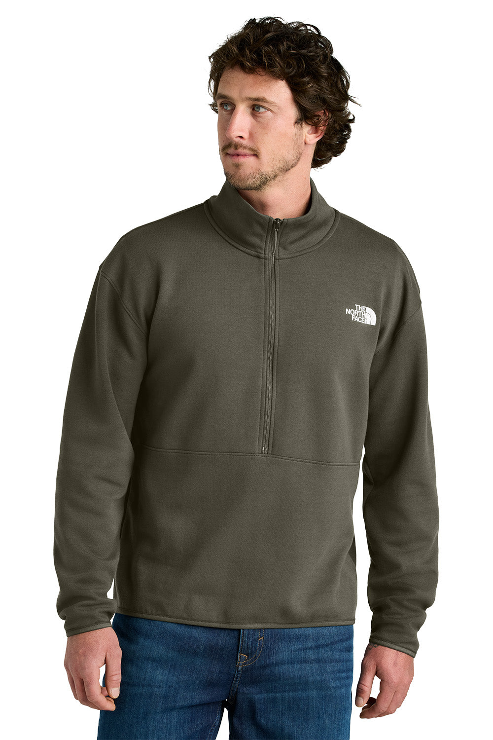 Man wearing a green half-zip sweatshirt with a brand logo on a white background, embroidered The North Face® Double-Knit 1/2-Zip Fleece