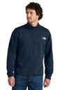 Man wearing a navy blue pullover with a brand logo on a white background embroidered The North Face® Double-Knit 1/2-Zip Fleece