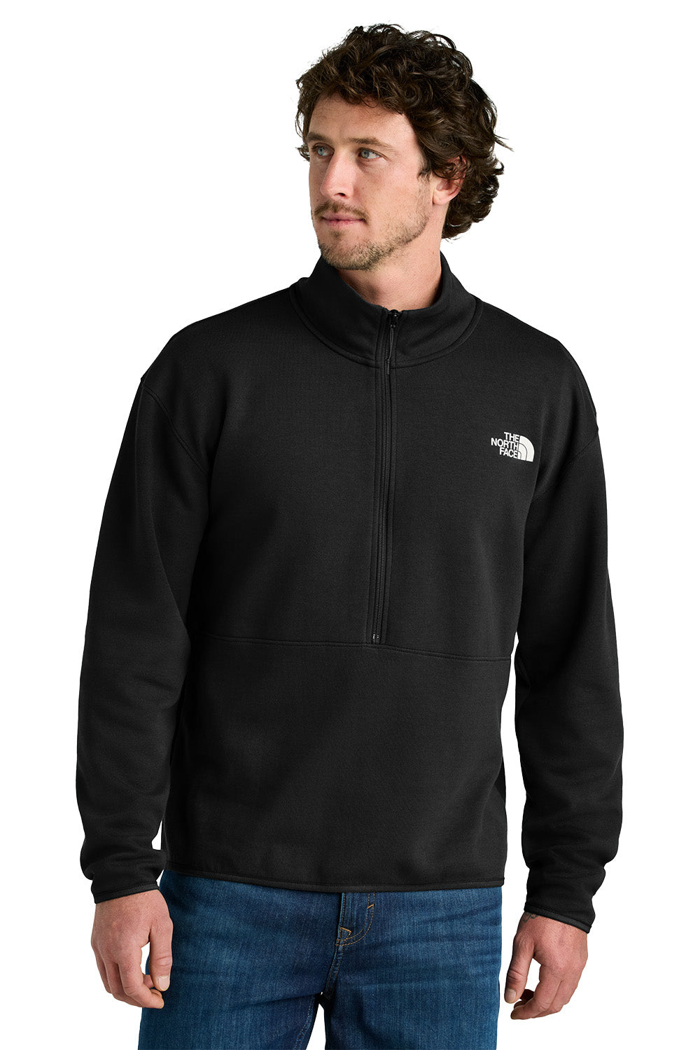 Man wearing a black half-zip sweatshirt with 'The North Face' logo on a white background embroidered The North Face® Double-Knit 1/2-Zip Fleece