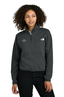 Person wearing a gray pullover with a logo on a white background embroidered The North Face® Women's Double-Knit 1/2-Zip Fleece