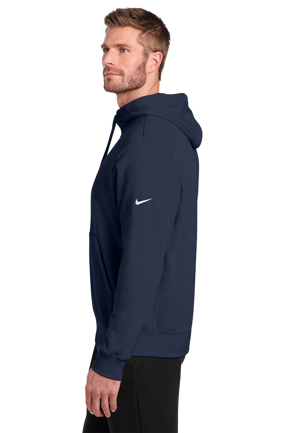 Man wearing a navy blue hoodie with a Nike logo on a white background, embroidered Nike Club Fleece Sleeve Swoosh Full-Zip Hoodie
