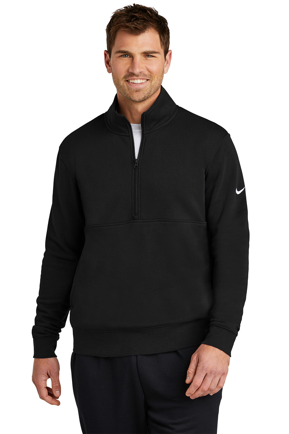 Man wearing a black Nike quarter-zip sweatshirt on a white background, Embroidered Nike Club Fleece Sleeve Swoosh 1/2-Zip