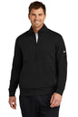 Man wearing a black Nike quarter-zip sweatshirt on a white background, Embroidered Nike Club Fleece Sleeve Swoosh 1/2-Zip