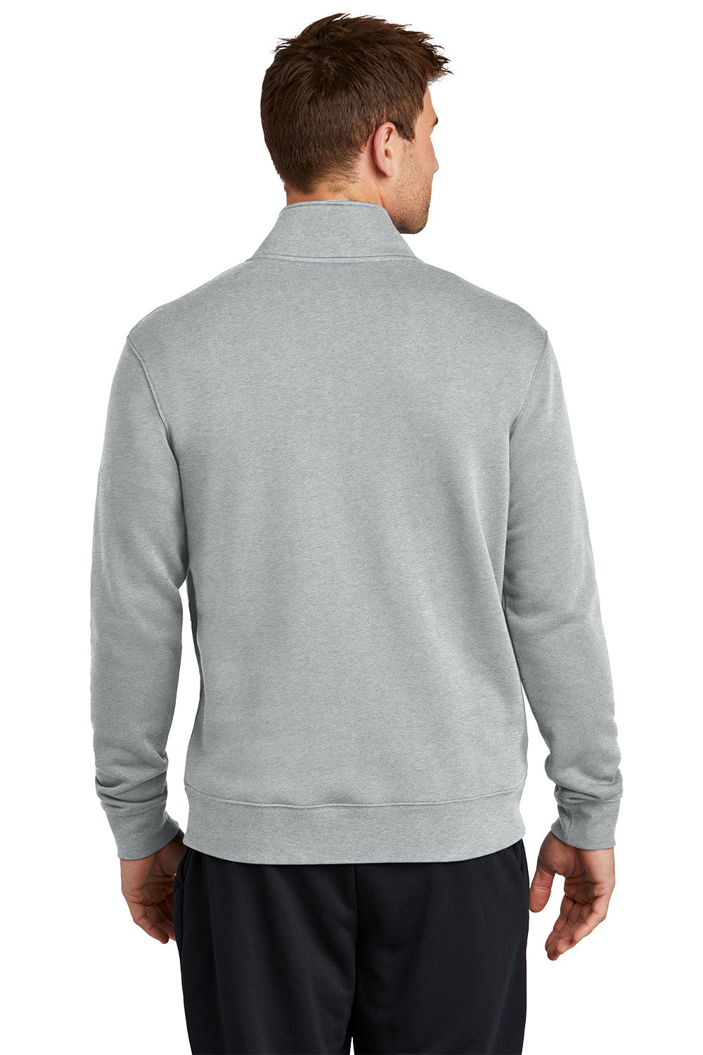 Man wearing a gray quarter-zip sweatshirt on a white background, Embroidered Nike Club Fleece Sleeve Swoosh 1/2-Zip