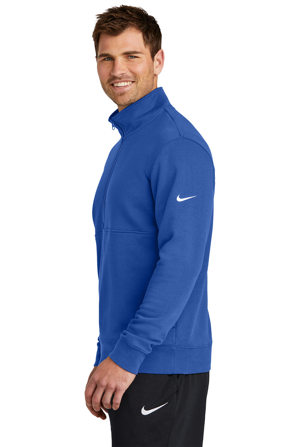 Man wearing a blue Nike jacket on a white background, Embroidered Nike Club Fleece Sleeve Swoosh 1/2-Zip