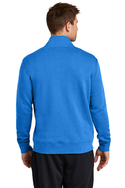 Person wearing a blue jacket on a white background, Embroidered Nike Club Fleece Sleeve Swoosh 1/2-Zip