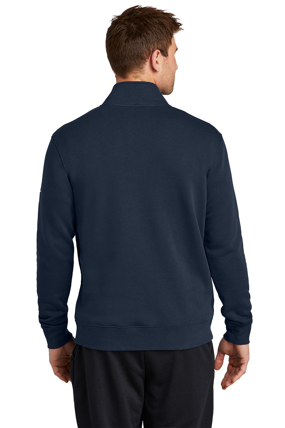 Man wearing a navy blue pullover on a white background, Embroidered Nike Club Fleece Sleeve Swoosh 1/2-Zip