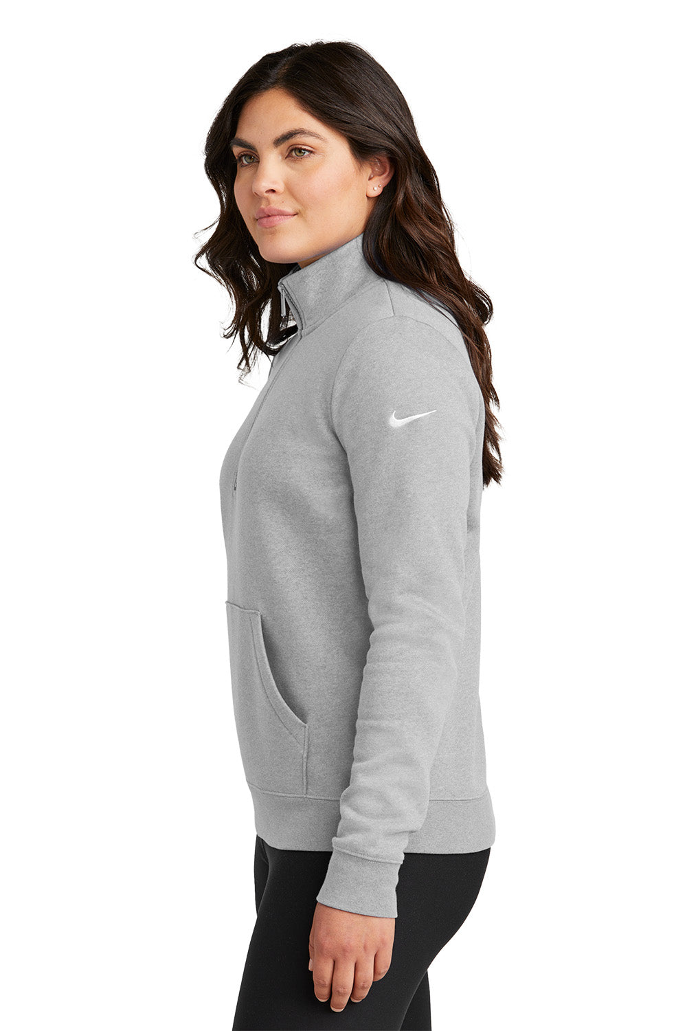 Woman wearing a gray Nike jacket on a white background, Embroidered Nike Women's Club Fleece Sleeve Swoosh 1/2-Zip
