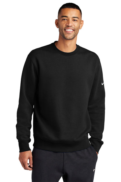 Man wearing a black Nike sweatshirt on a white background embroidered Nike Club Fleece Sleeve Swoosh Crew
