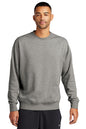 Man wearing a gray sweatshirt on a white background embroidered Nike Club Fleece Sleeve Swoosh Crew